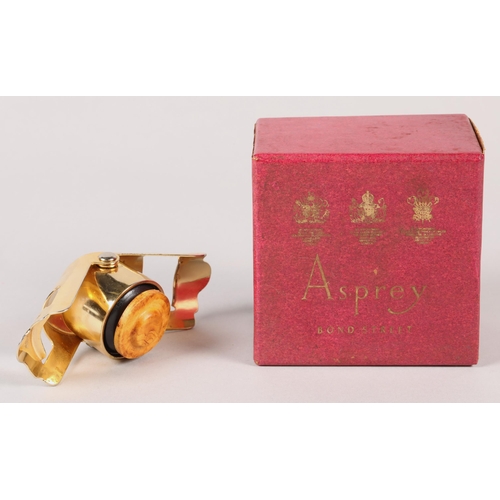 66 - Asprey gold plated bottle stopper