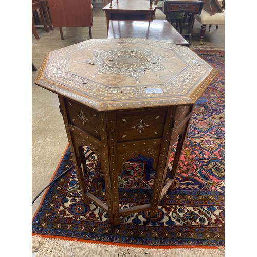 577 - Indian inlaid occasional octagonal table 61 cm high