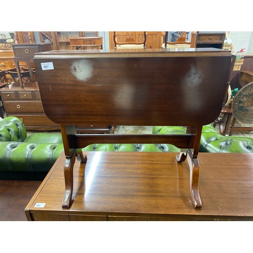 587 - Small mahogany drop leaf table, 56 cm