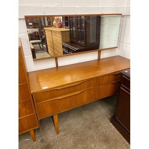 618 - Mid century Teak bedroom suite, dressing table with mirror,  Five drawer chest, wardrobe