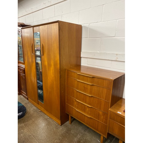 618 - Mid century Teak bedroom suite, dressing table with mirror,  Five drawer chest, wardrobe