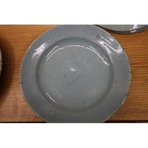 135 - Celadon tin glazed earthenware dishes, 20cm and 17cm diameter.