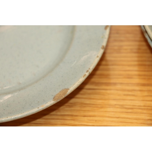 135 - Celadon tin glazed earthenware dishes, 20cm and 17cm diameter.