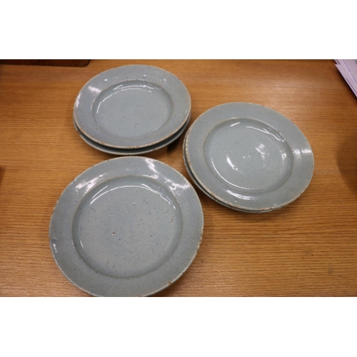 135 - Celadon tin glazed earthenware dishes, 20cm and 17cm diameter.