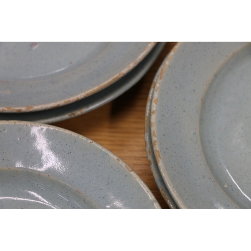 135 - Celadon tin glazed earthenware dishes, 20cm and 17cm diameter.