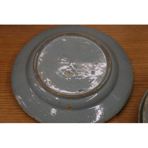 135 - Celadon tin glazed earthenware dishes, 20cm and 17cm diameter.