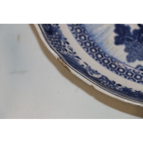 137 - Four Chinese blue and white dishes decorated with pavilion and garden scenes, 25cm and 23cm diameter... 