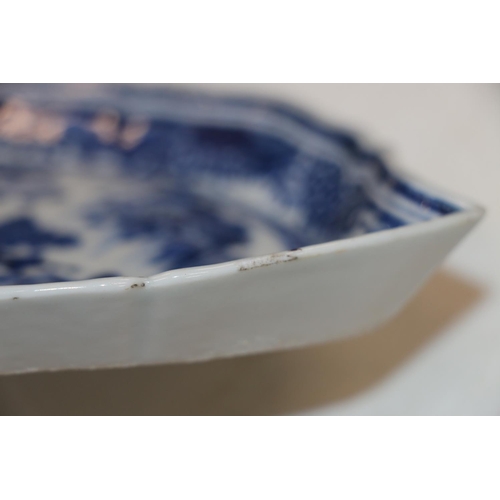 139 - Chinese blue and white porcelain dish of boteh form decorated with pavilion garden scene, 19cm high.