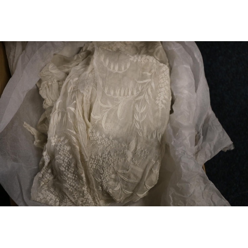 321 - Quantity of linens and lace to include robes, veil, etc.