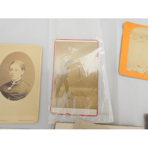 259 - Photographs.  A small bundle of carte-de-visite & stereoscope photographs & related items.... 