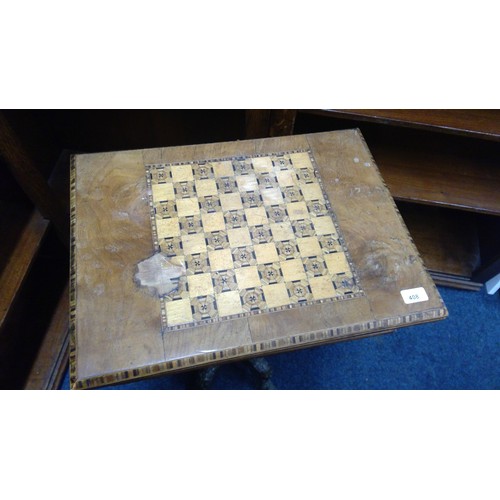 408 - Victorian walnut and inlaid work table, having chess board top raised on column with four snake feet... 