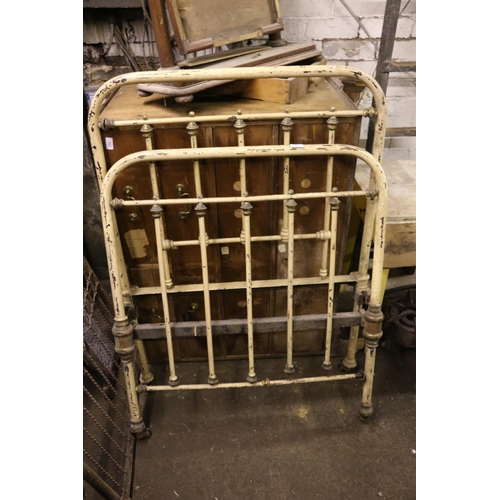 253A - Two Victorian wrought iron painted single bed frames.