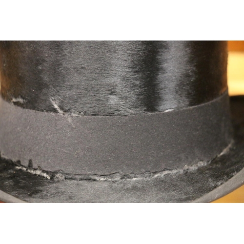 102 - Lincoln Bennett & Co. of London top hat in large leather carrying box.