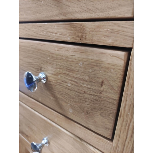 496 - Pair of modern oak bedside drawers.