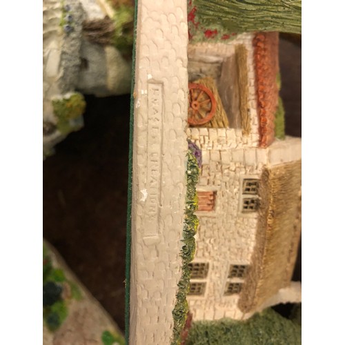 244 - Eight Lilliput Lane models of cottages and churches