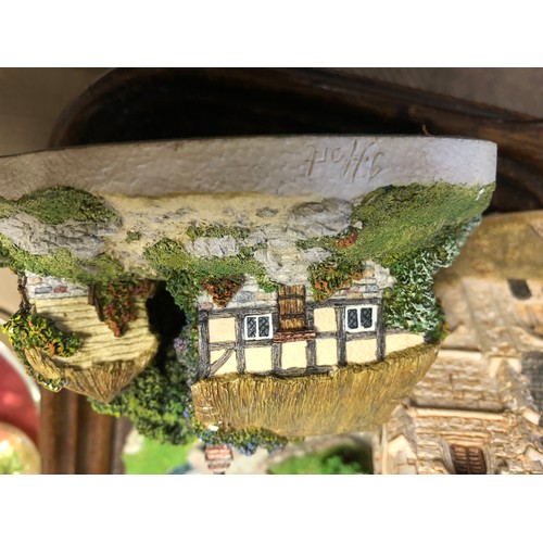 244 - Eight Lilliput Lane models of cottages and churches