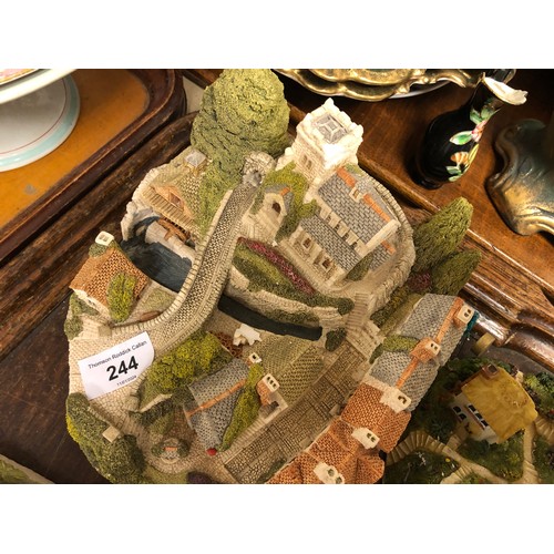 244 - Eight Lilliput Lane models of cottages and churches