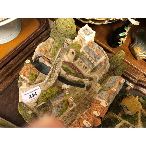 244 - Eight Lilliput Lane models of cottages and churches