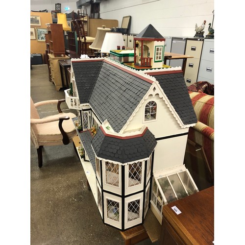 607 - Vintage dolls house with furnishings