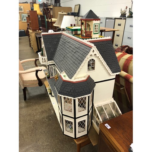 607 - Vintage dolls house with furnishings