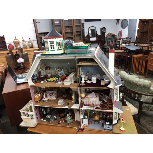 607 - Vintage dolls house with furnishings