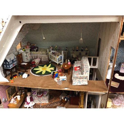 607 - Vintage dolls house with furnishings