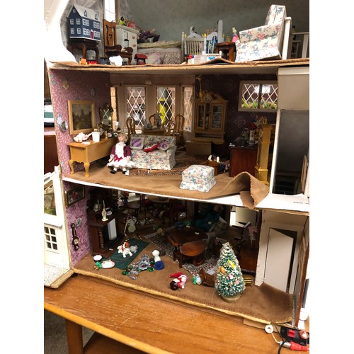 607 - Vintage dolls house with furnishings