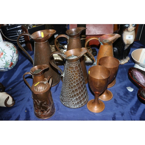57 - Five Joseph Sankey & Son, and other, copper jugs, an Art Nouveau style Joseph Sankey & Son w... 