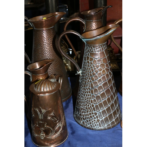 57 - Five Joseph Sankey & Son, and other, copper jugs, an Art Nouveau style Joseph Sankey & Son w... 