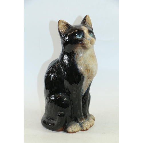 58 - Ceramic model of a seated cat, 30cm high.