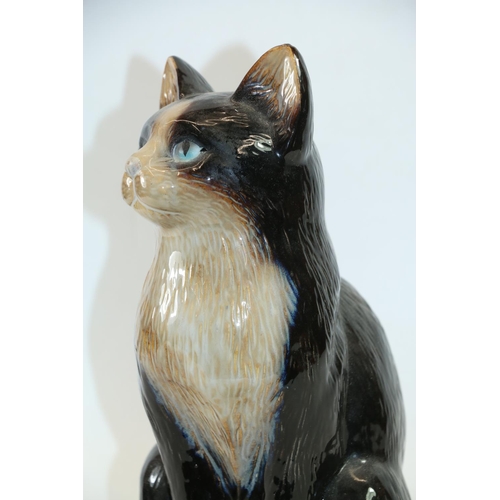 58 - Ceramic model of a seated cat, 30cm high.