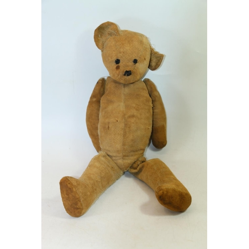 6 - Mid-20th century teddy bear with sewn black nose and eyes, 56cm.