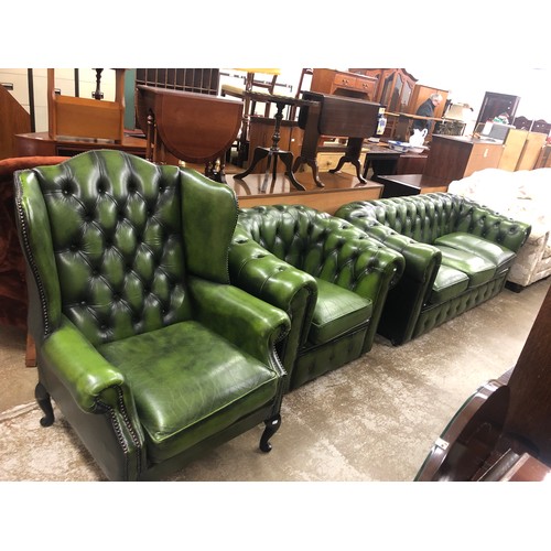 559 - Three seater green leather Chesterfield settee, Green leather matching arm chair, Green leather wing... 