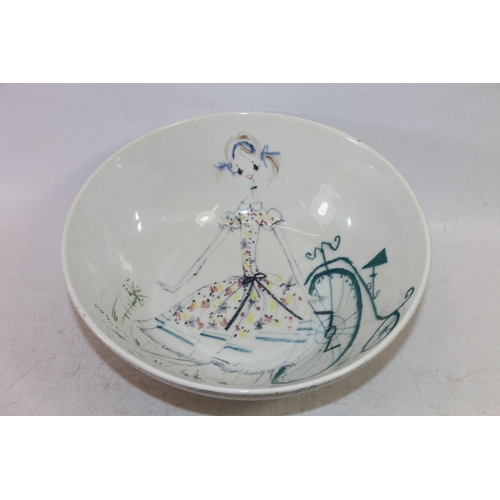 102 - Mid-20th century Italian pottery bowl decorated with a young girl and penny farthing.