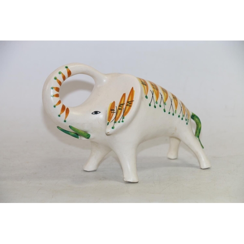 103 - Mid-20th century retro ceramic model of an elephant with abstract decoration, 19cm.