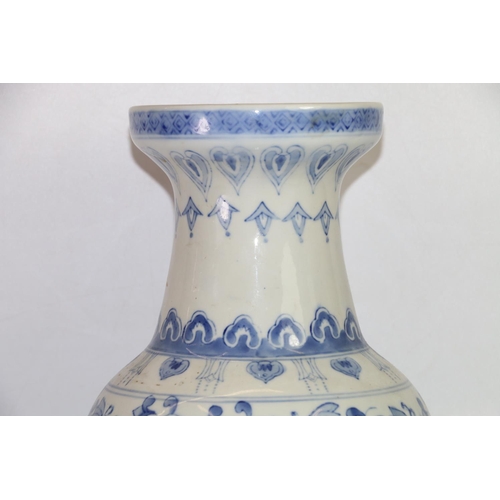 104 - Chinese style blue and white vase, 45cm high.