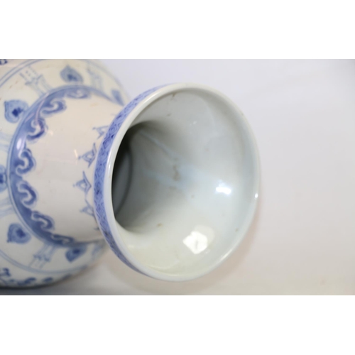 104 - Chinese style blue and white vase, 45cm high.