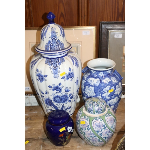 105 - Continental blue and white vase and cover, and three other pottery vases and jars, largest 49cm.