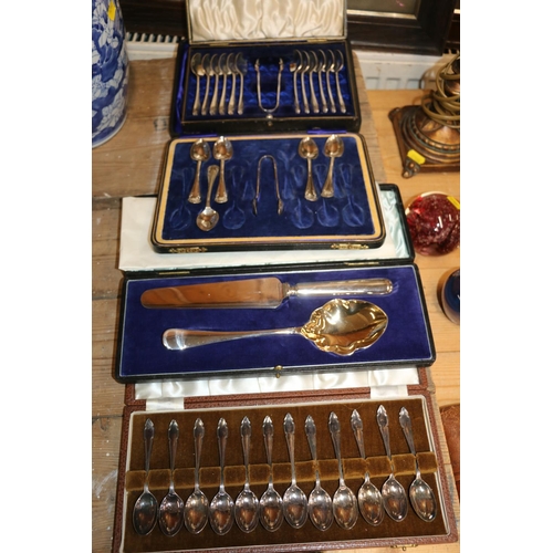 107 - Silver-plate to include two cased sets of teaspoons, a part set of teaspoons with sugar tongs, and a... 