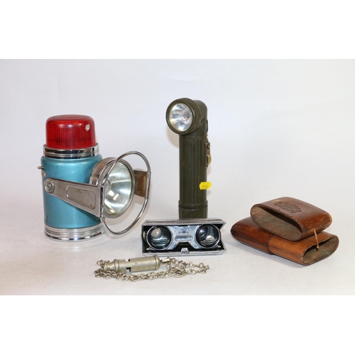 111 - Mid-20th century bicycle lamp with a military torch, a leather cigar case, opera glasses, and a metr... 