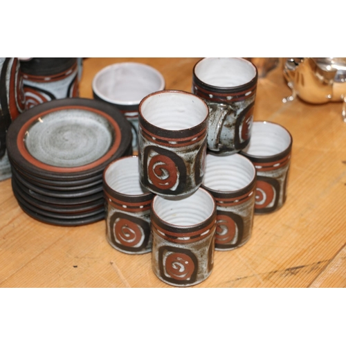 113 - 1970s Studio Pottery coffee set comprising a coffee pot, a milk jug, a sugar bowl and eights cups an... 