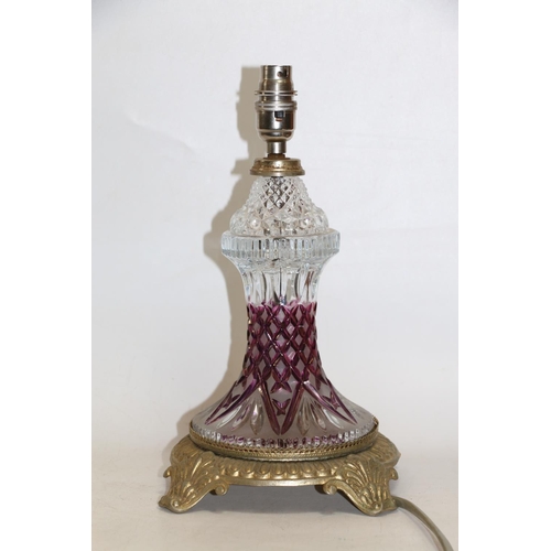 117 - Moulded glass and brass base lamp.