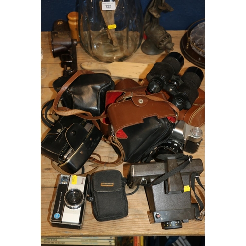 123 - Vintage cameras and binoculars to include a Zenit 3M, etc.