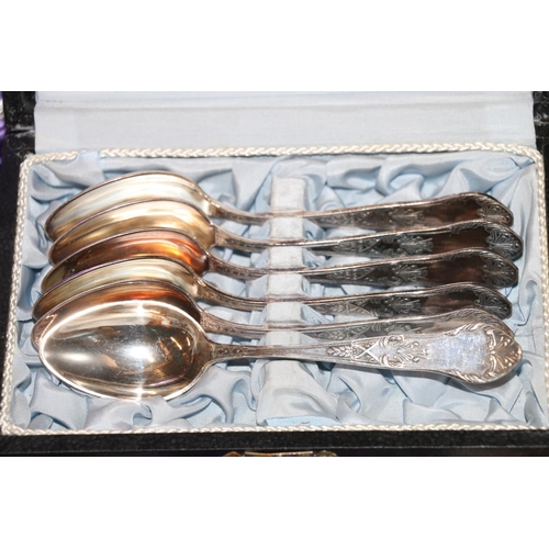 129 - Cased sets of cutlery to include dessert spoons, dinner knives and forks, teaspoons, etc.