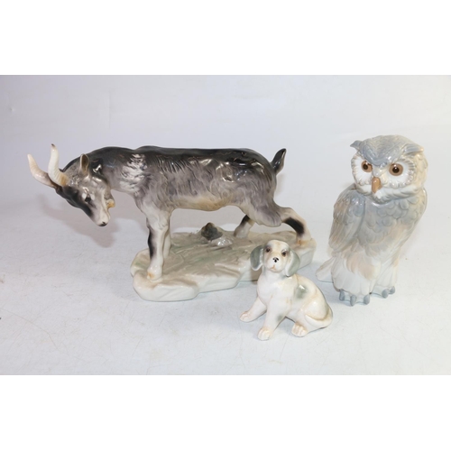 141 - Continental ceramic model of a mountain goat, a Nao owl model and a pottery model of a dog, largest ... 