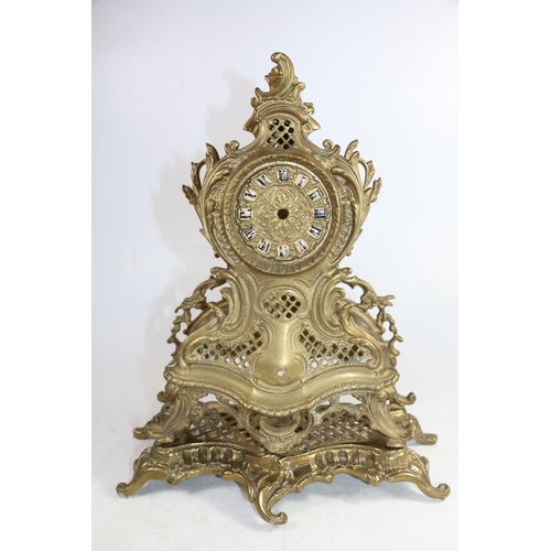 143 - Reproduction French brass mantel clock, 32cm.