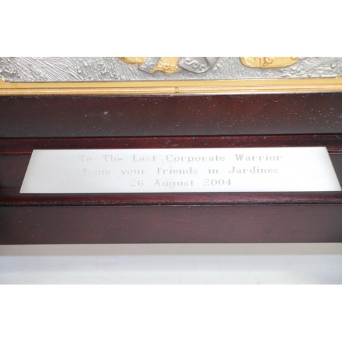 148 - Royal Selangor pewter plaque depicting a Chinese Immortal with calligraphy script to rear, in hardwo... 