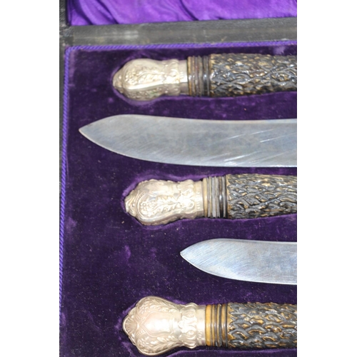 150 - Late 19th century carving set by Duncan and Scobbie, Sheffield, with horn effect handles and silver ... 