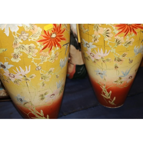 151 - Pair of large continental pottery vases decorated in a chinoiserie style, 56cm high.