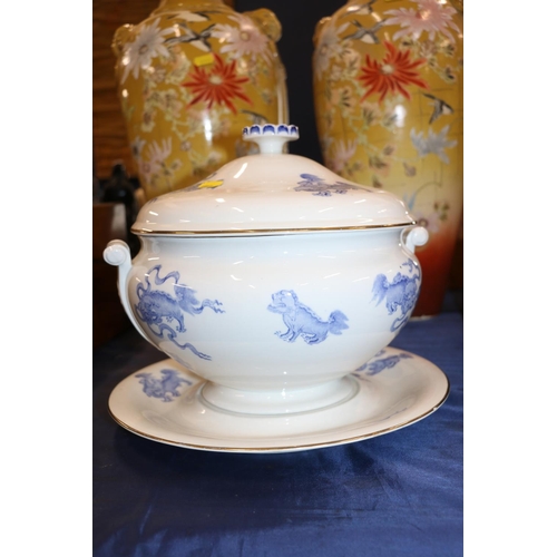 152 - Early 20th century Wedgwood blue and white tureen and stand decorated with Foo Dogs, 26cm high.